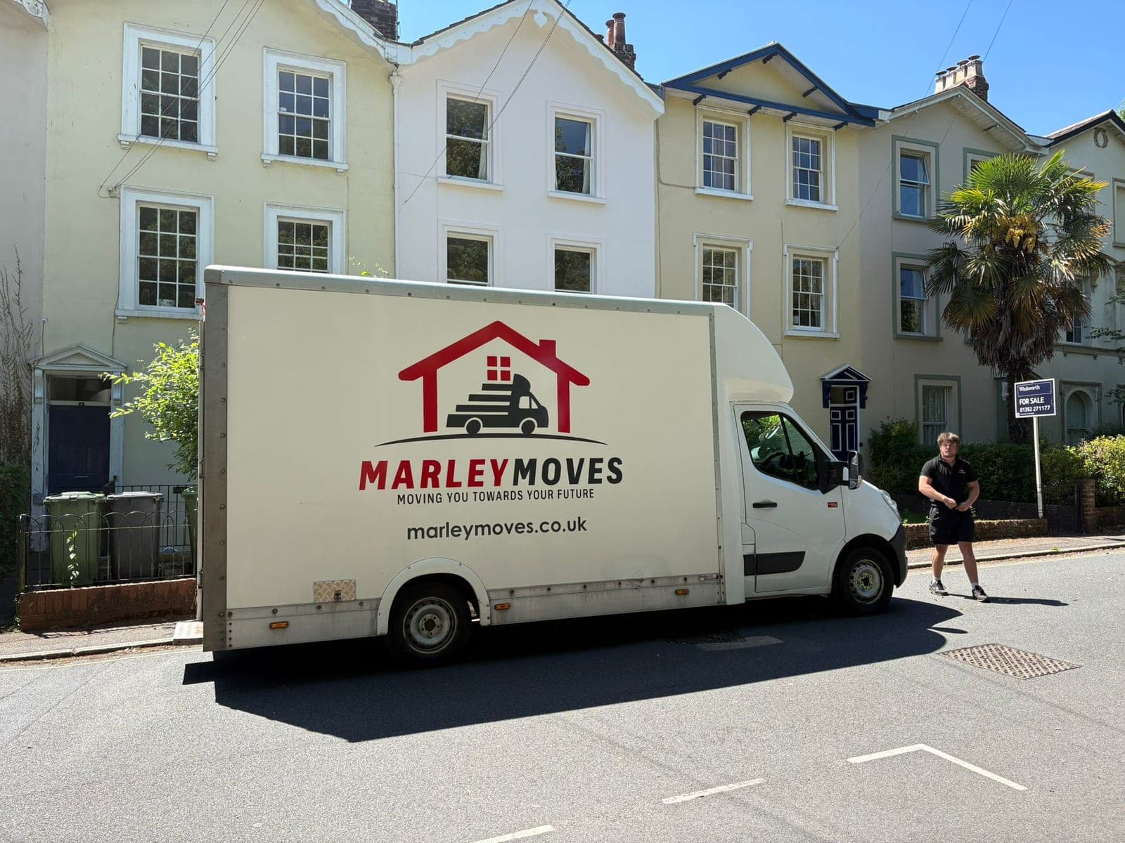 Marley Moves branded Luton van parked outside a property on a Dorset side-street, the in-house team that relocates offices across Dorset, Somerset and Wiltshire