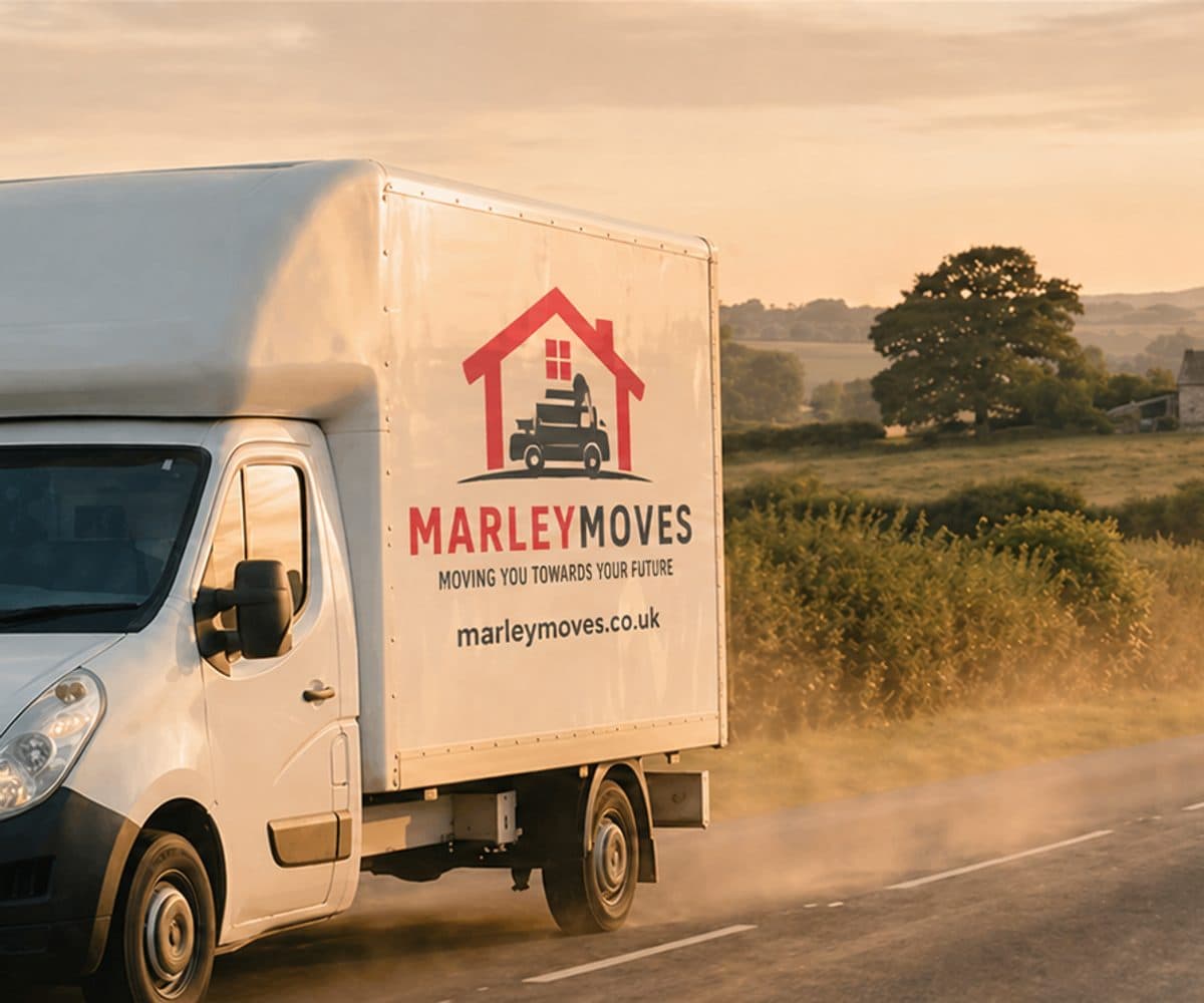 Marley Moves branded Luton van on a Dorset country road, the in-house team that keeps a business running through a seamless office relocation
